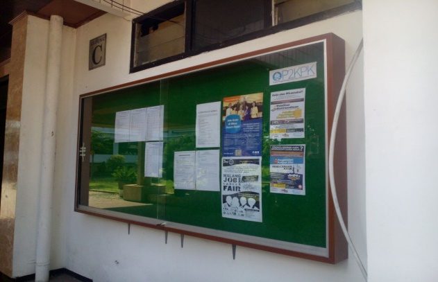 Papan informasi P2KPK di lingkungan kampus Uniga